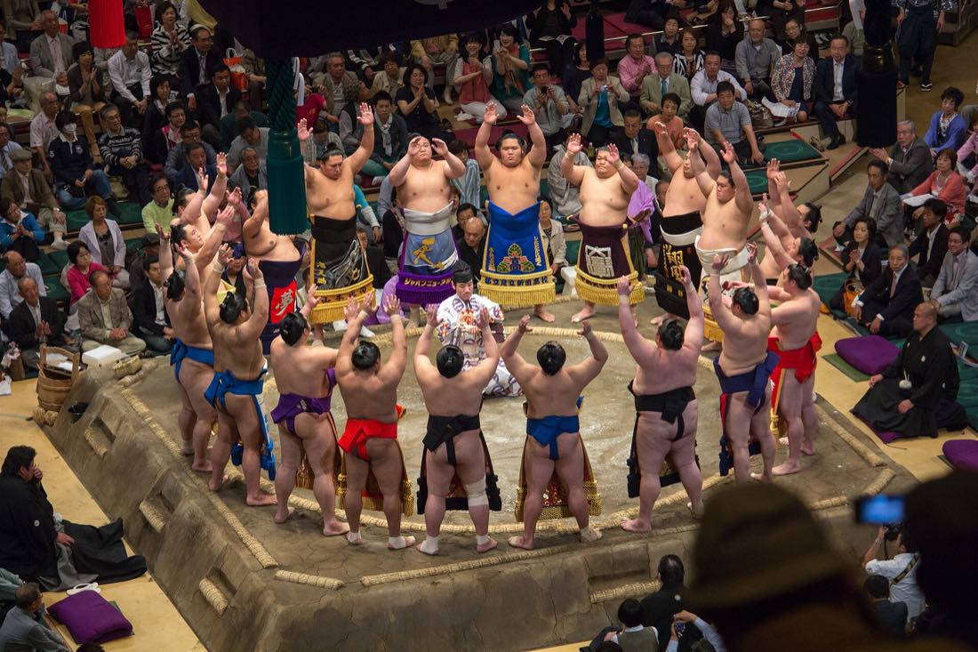 Sumo wrestlers performing the dohyo-iri ring-entering ceremony